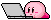 a gif of kirby laying down on the floor playing with his notebook